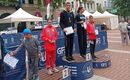 Cmkpnkn Restye Zsombor a dobog tetejn, miutn korosztlyban megnyerte a 3000 mteres tvot a Fuss s segts! jtkonysgi futversenyen