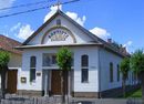 A Gyulai Baptista Gy�lekezet Munk�csy Mih�ly utcai �p�let�ben, tanszeradom�nyt adtak �t a Gyulai Szoci�lis Szolg�ltat� K�zpont �s a Baptista Tev�keny Szeretet Misszi� Alap�tv�ny szervez�s�ben. K�p forr�sa: Magyarorsz�gi Baptista Egyh�z   