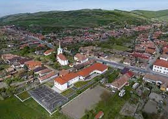 Az erd�lyi, Maros megyei Gyulakuta l�gi felv�telen. Marosv�s�rhelyt�l 21 km-re, d�lkeletre, a Kis-K�k�ll� jobb partj�n, a Bik�s-v�lgy torkolat�n�l fekszik. K�p forr�sa: Gyulakuta Facebook-oldala